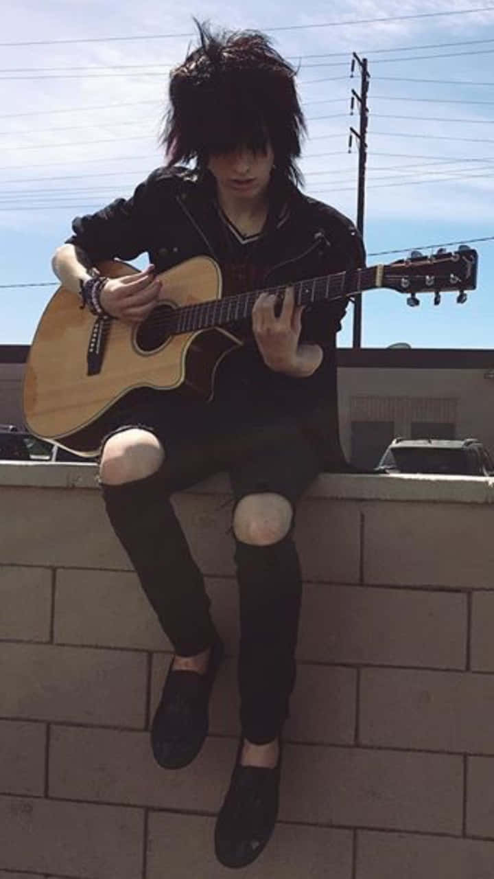 Emo Musician Outdoor Guitar Session Wallpaper