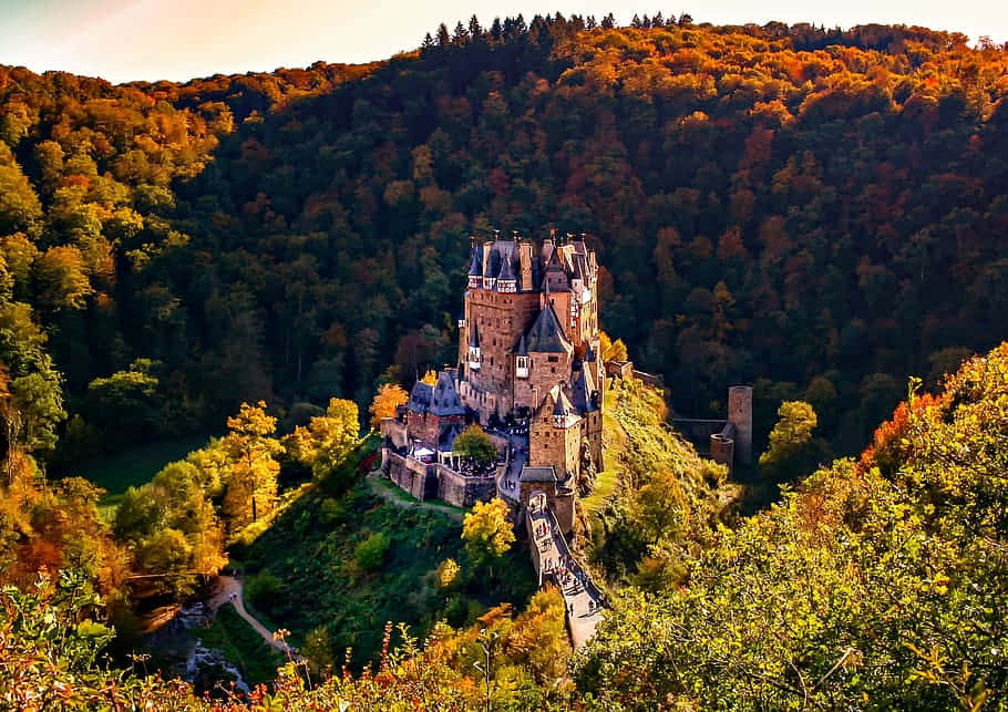 Enchanted Autumn Castle Wallpaper