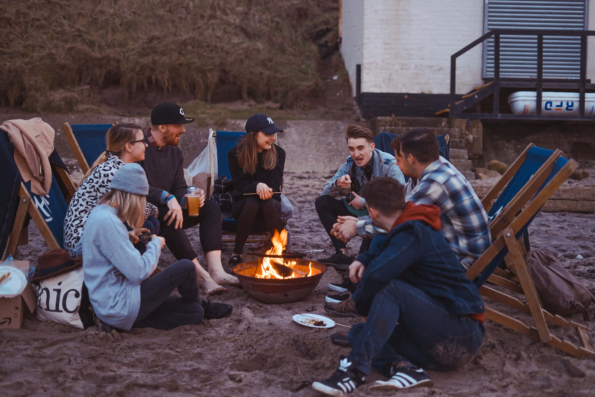 Engaged Youths In An Outdoor Activity Wallpaper