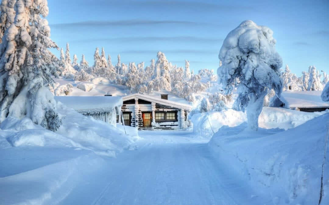 Enjoy A Beautiful Winter Day With Fresh Snowfall On A Christmas Morning. Wallpaper