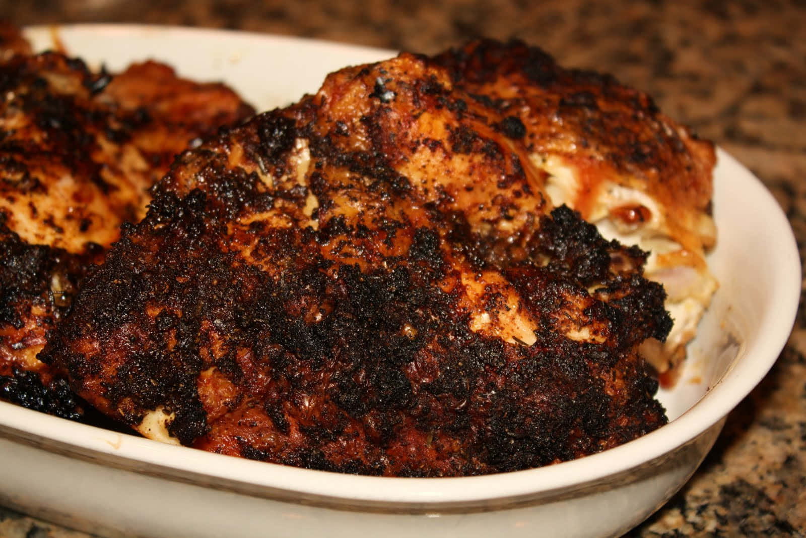 Enjoy A Delectable Meal Of Blackened Chicken Wallpaper