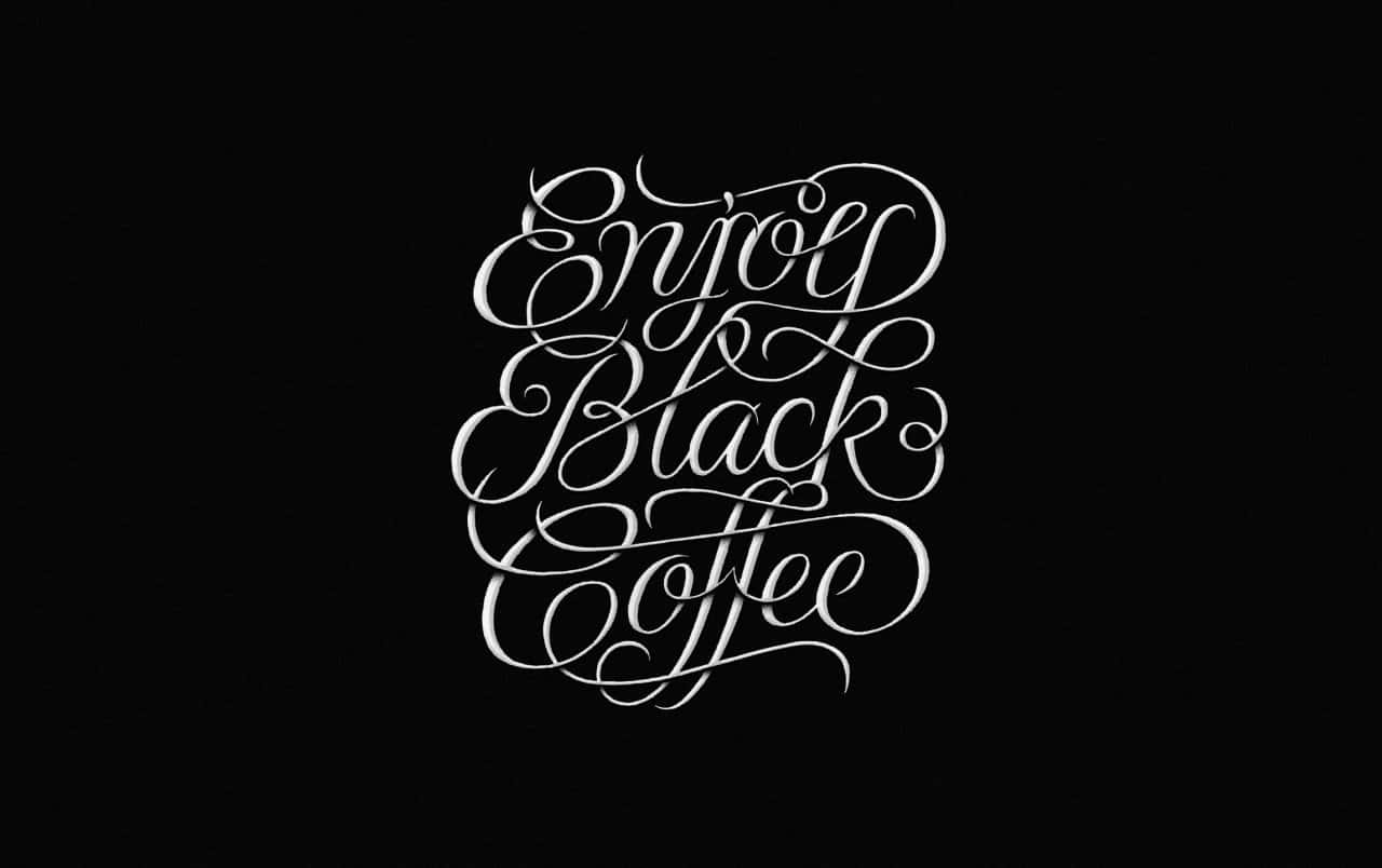 Enjoy A Delicious Cup Of Black Coffee Wallpaper