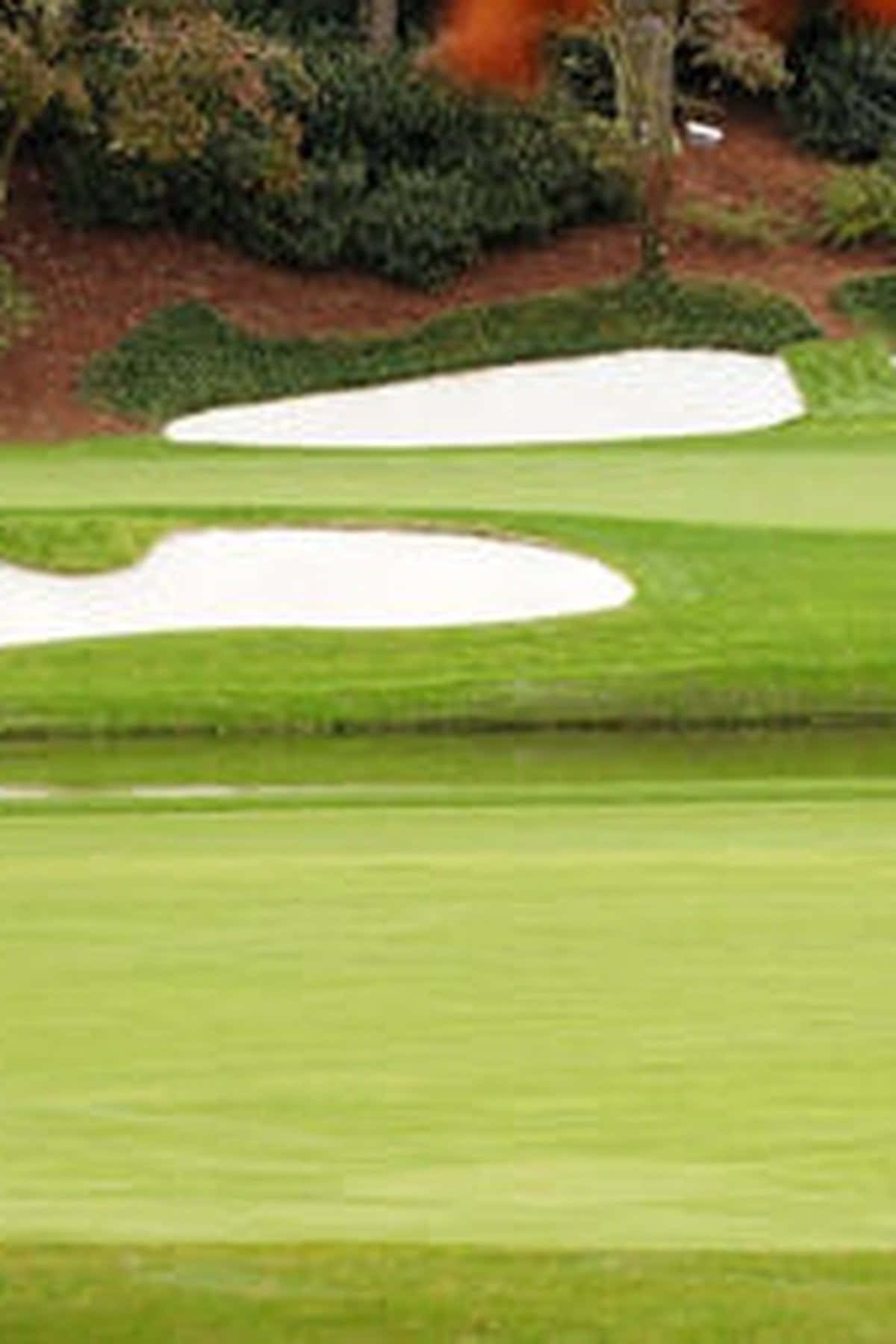 Enjoy A Round Of Golf At The World Famous Augusta National Golf Club Wallpaper