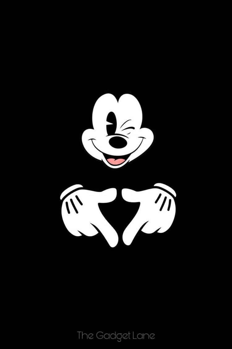 Enjoy Calls And Texts With A Black Mickey Mouse Phone Wallpaper