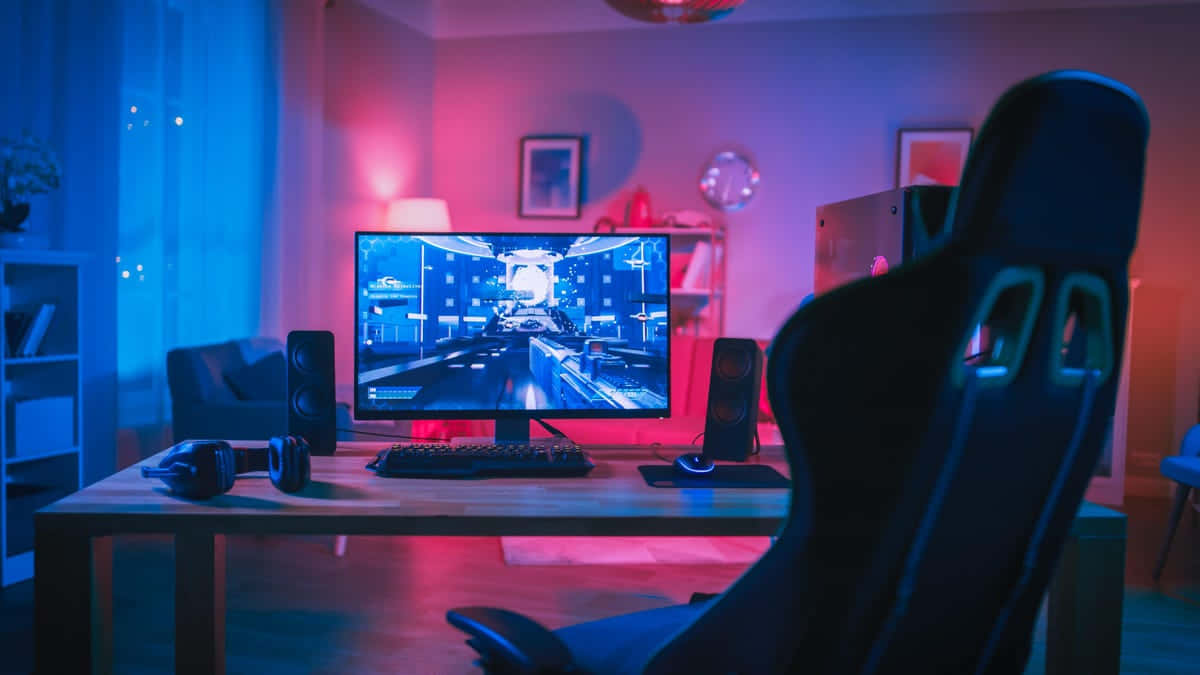 Enjoy Immersive Gaming With This State-of-the-art Pc Setup Wallpaper