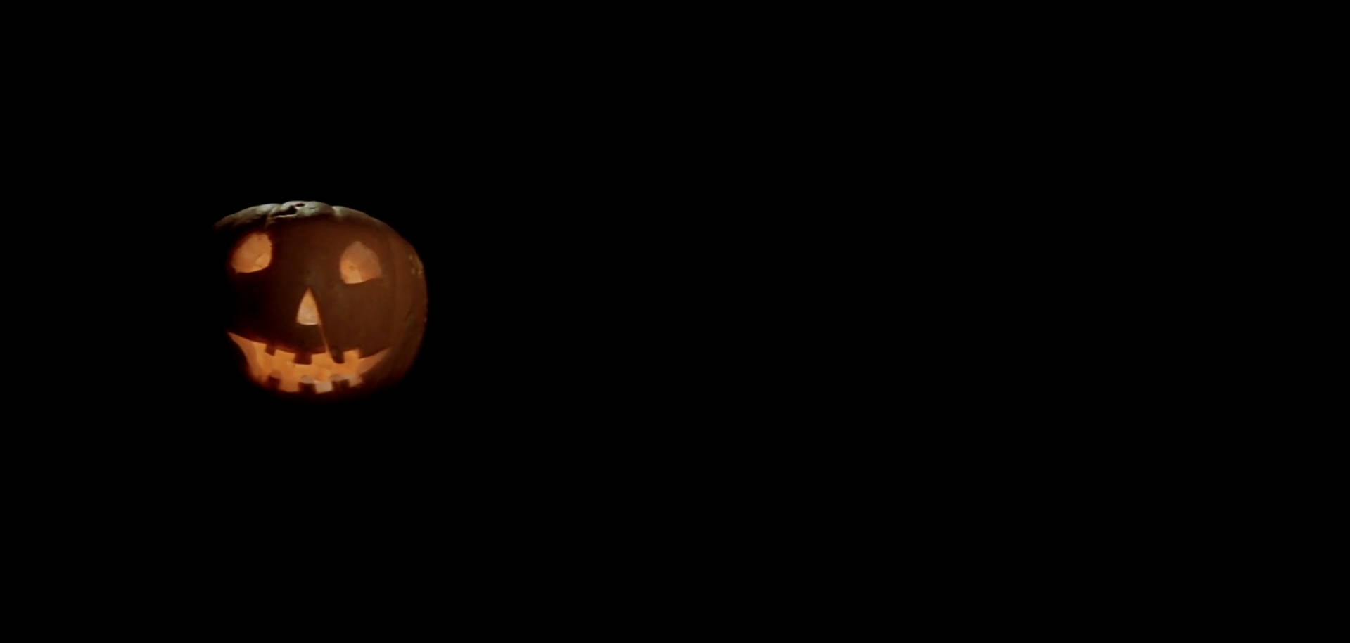 “enjoy The Halloween Festive Season With This Spooky Jack O'lantern” Wallpaper