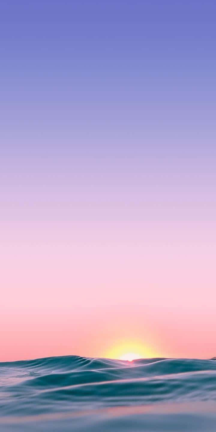 Enjoy The Serenity Of A Sunrise Wallpaper