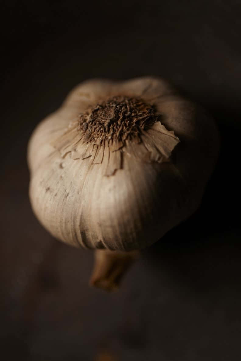 Enjoy The Unique Flavor Of Black Garlic Wallpaper