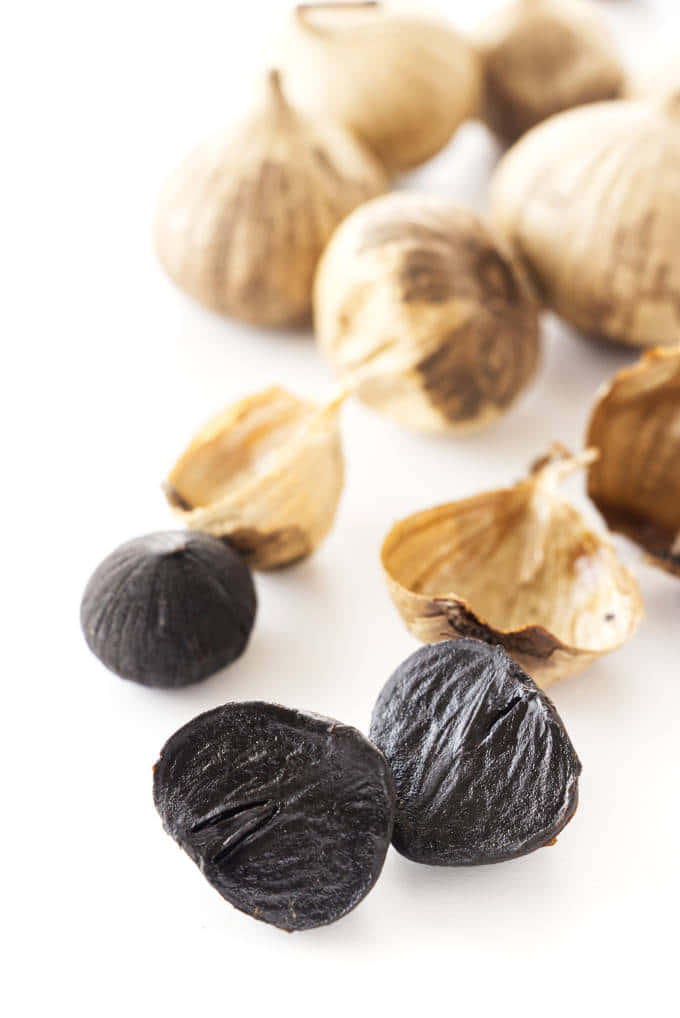 Enjoy The Unique Taste Of Black Garlic Wallpaper