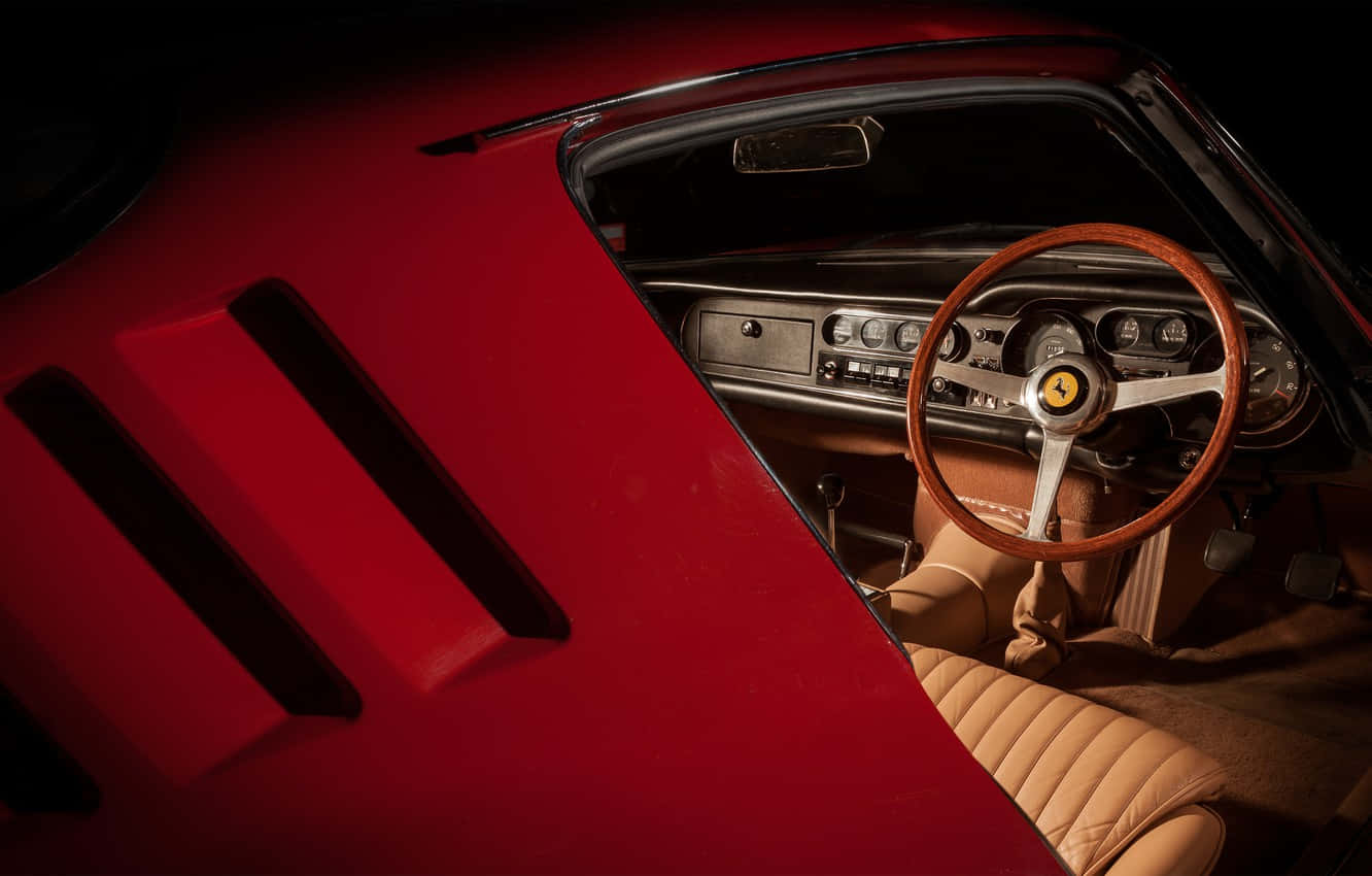 Enjoy The Unique Vintage Luxury Of A Classic Ferrari Wallpaper