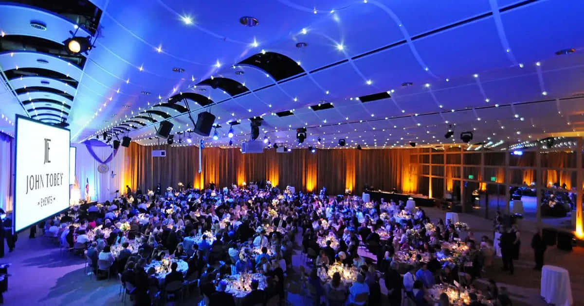 Enjoy The Vibrancy And Energy Of A Corporate Event. Wallpaper