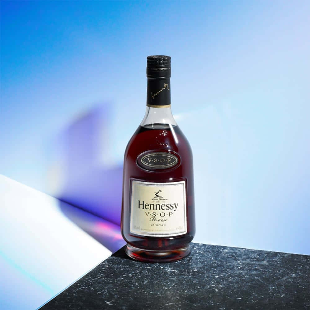 Enjoy Your Favorite Glass Of Hennessy Wallpaper