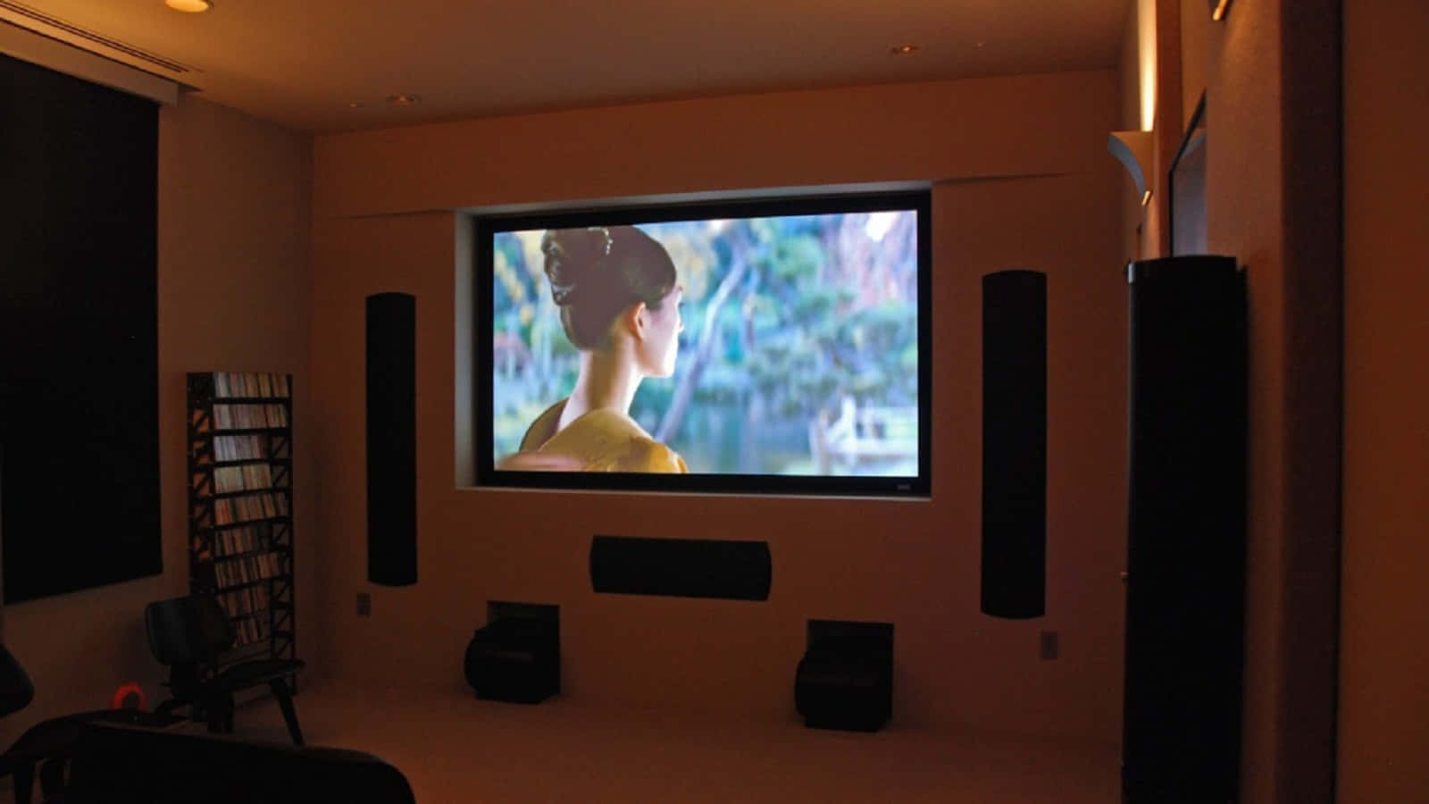 Enjoy Your Favorite Movies And Tv Shows In The Comfort Of Your Home Cinema Wallpaper