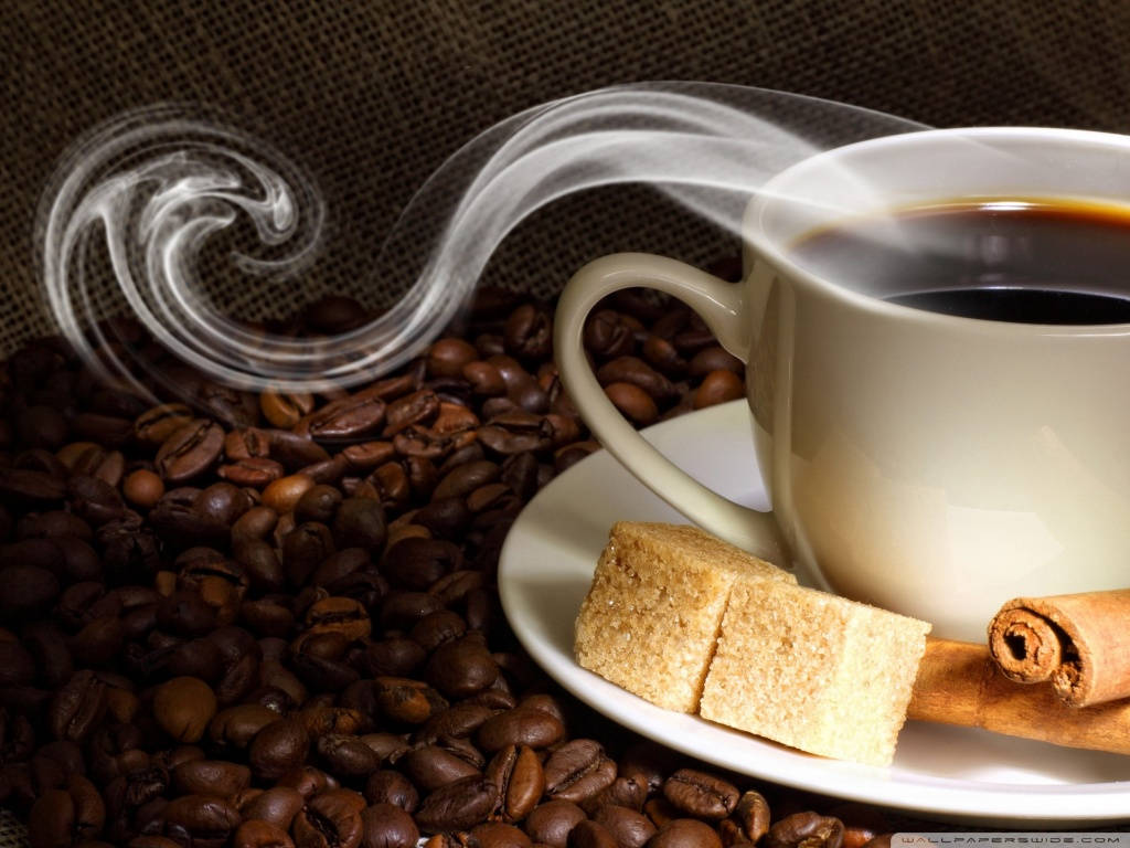 Enjoy Your Morning With A Cup Of Freshly Brewed Coffee Wallpaper