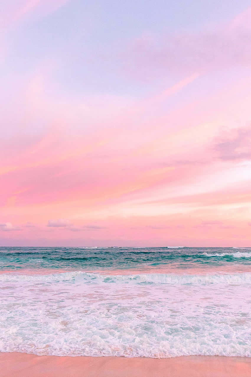 Enjoying A Calm And Pastel-hued Beach Wallpaper