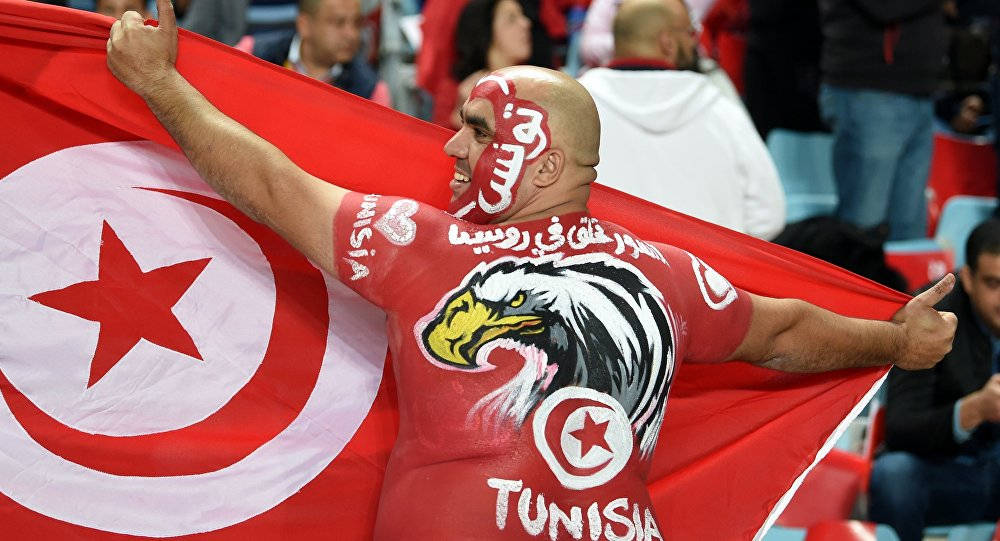 Enthusiastic Fan Cheering For Tunisia National Football Team Wallpaper