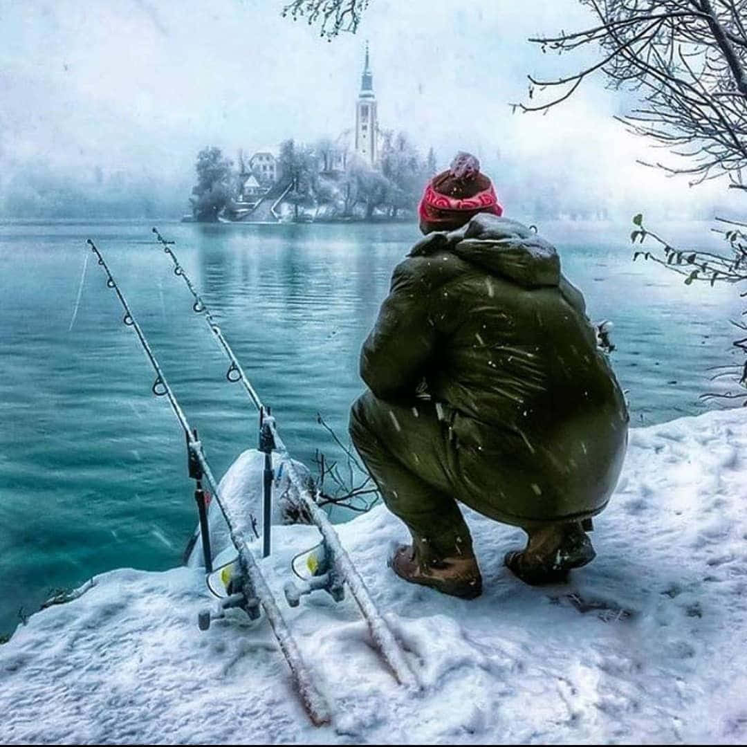 Enthusiastic Ice Anglers Enjoying Their Winter Fishing Adventure Wallpaper