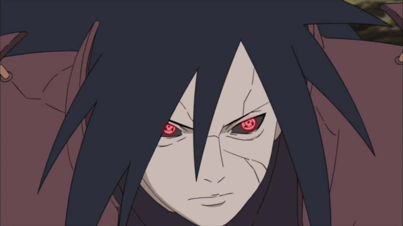 Epic Madara Uchiha In Battle Stance Wallpaper