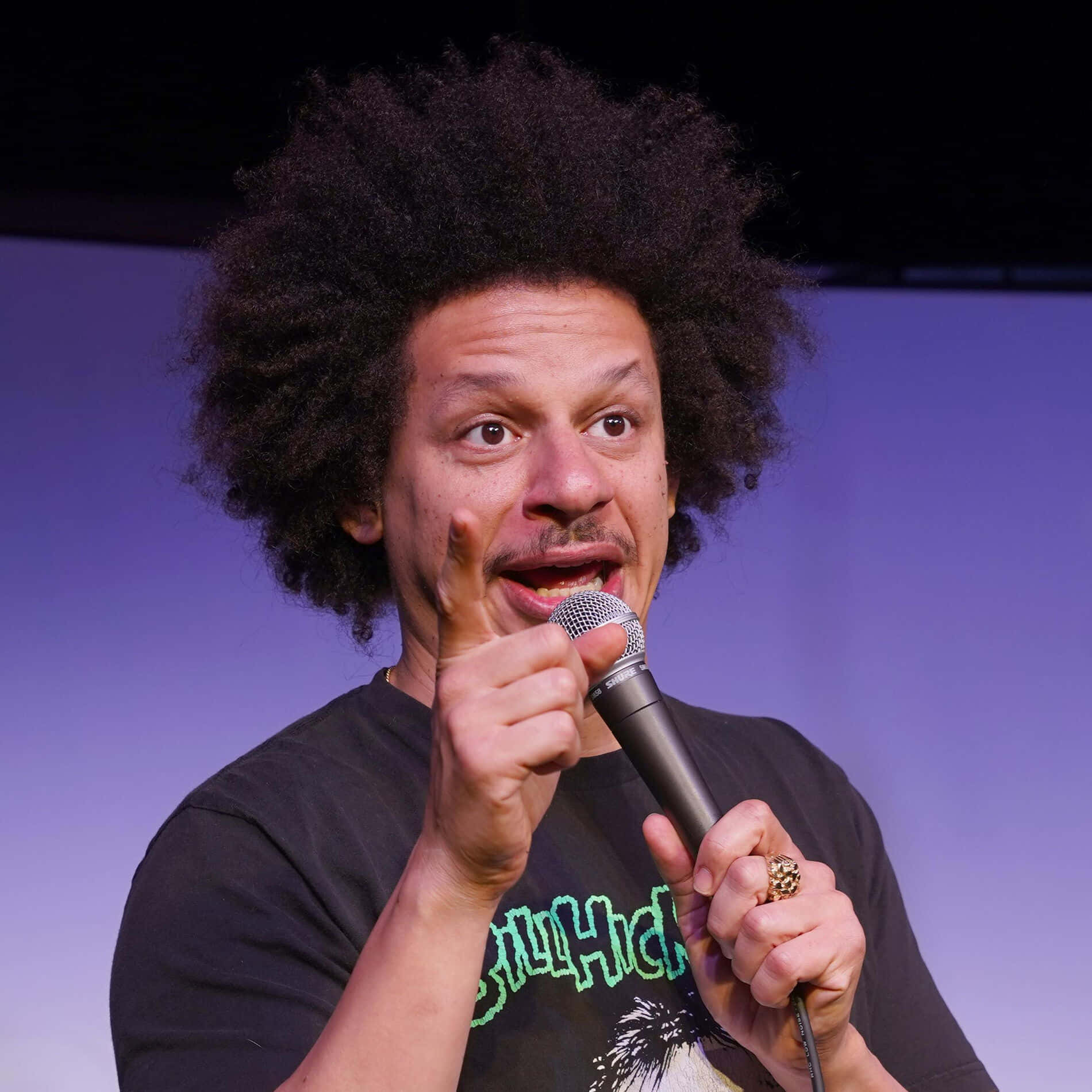 Eric Andre Comedy Performance Wallpaper