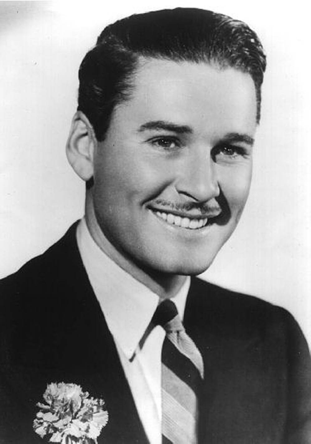 Errol Flynn Smiling In Suit Black And White Wallpaper