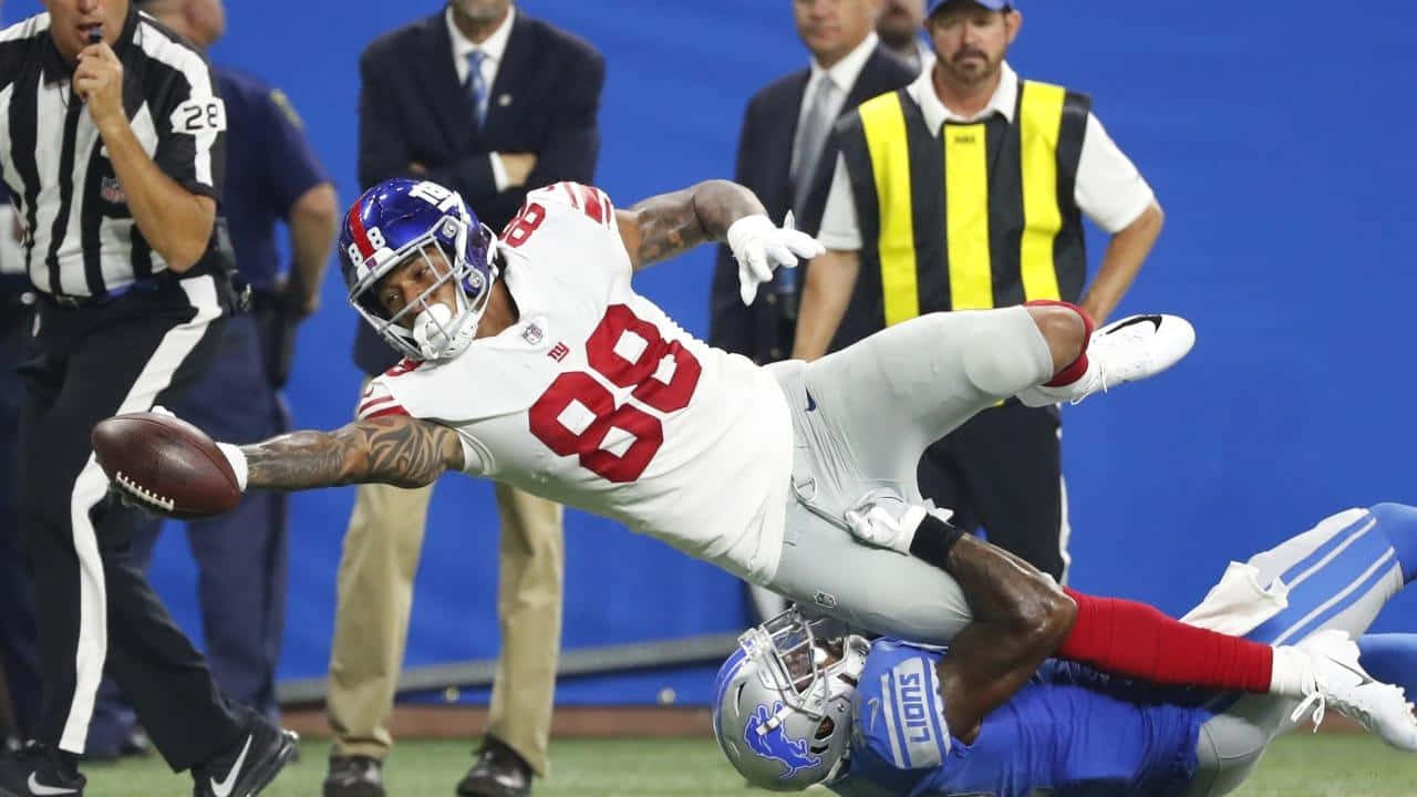 Evan Engram Diving Catch Attempt Wallpaper