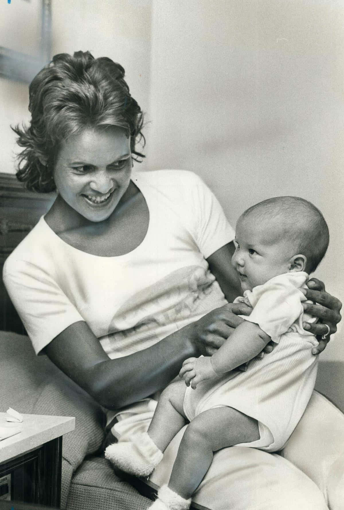 Evonne Goolagong Cawley Sharing A Moment With Her Daughter Wallpaper