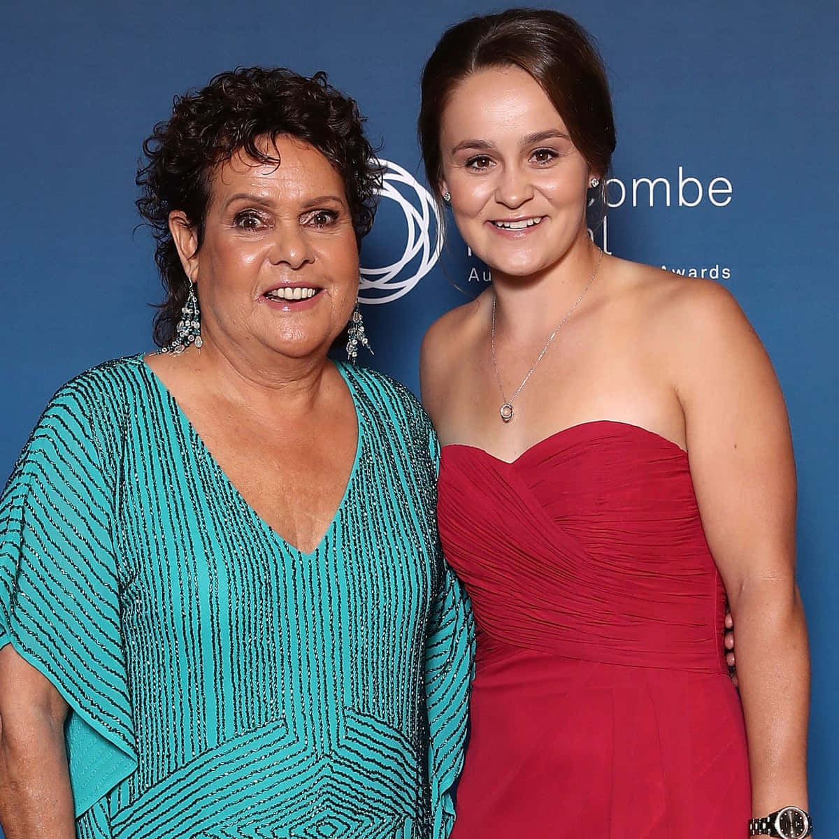 Evonne Goolagong Cawley With Ashleigh Barty On The Tennis Court Wallpaper