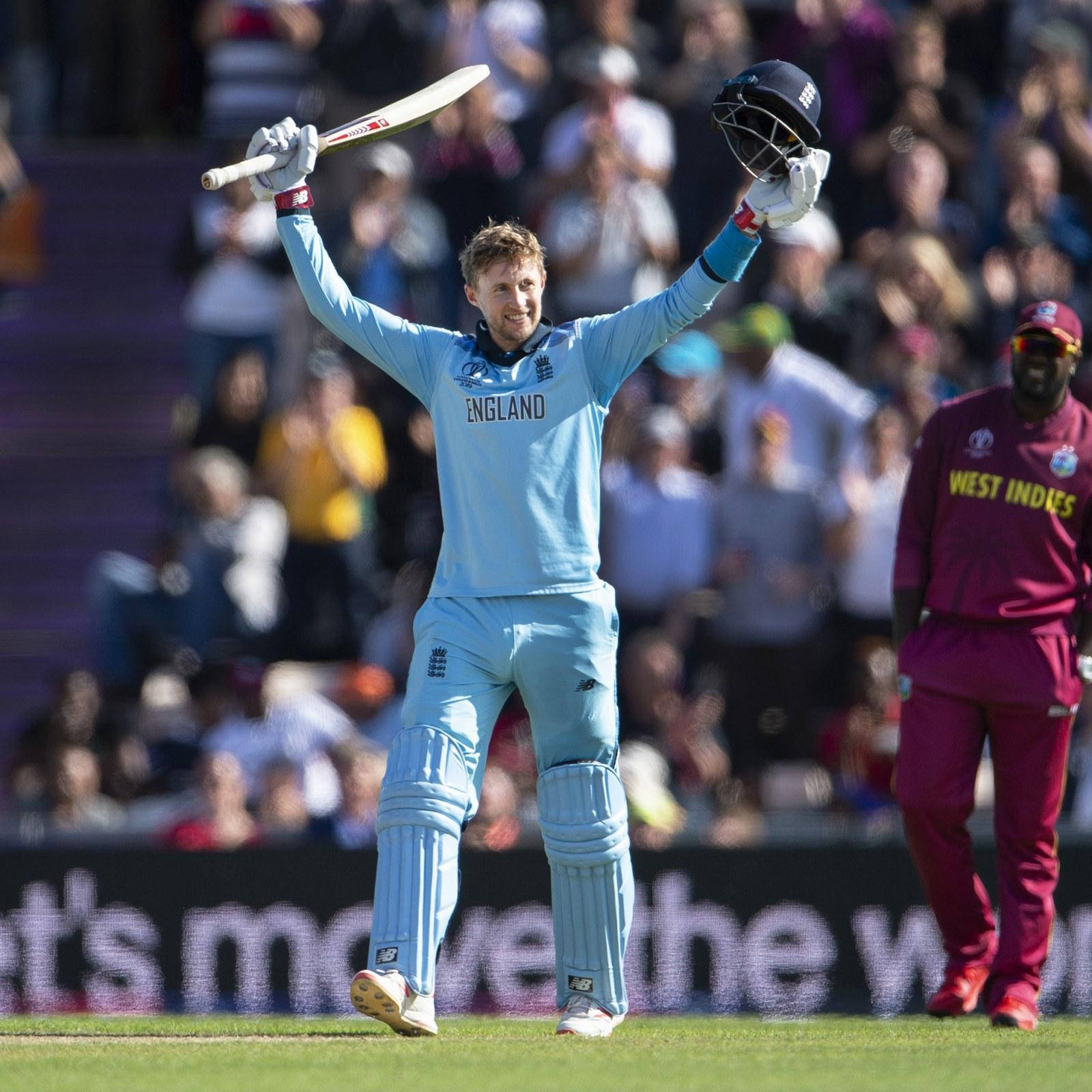 Exceptional Cricketer Joe Root Dressed In Sky Blue Kit Wallpaper