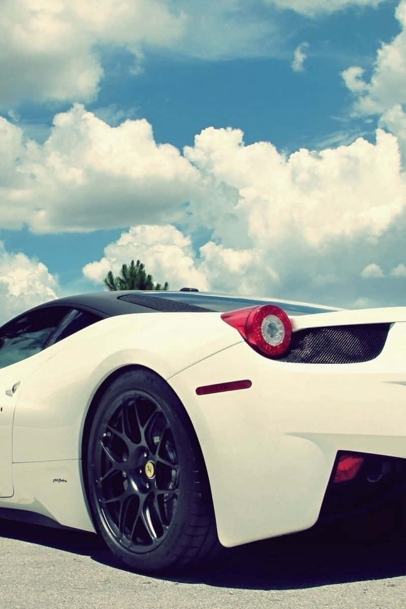 Experience The Luxury Of Driving A White Ferrari In Your Pocket Wallpaper