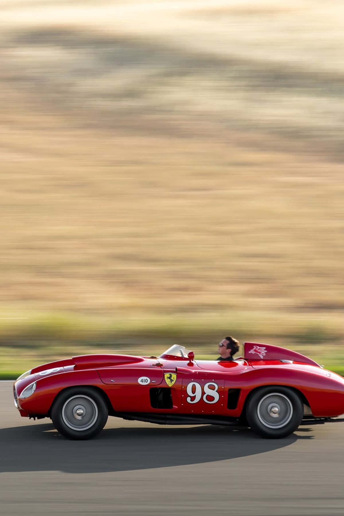 Experience The Thrill Of Driving A Classic Ferrari. Wallpaper