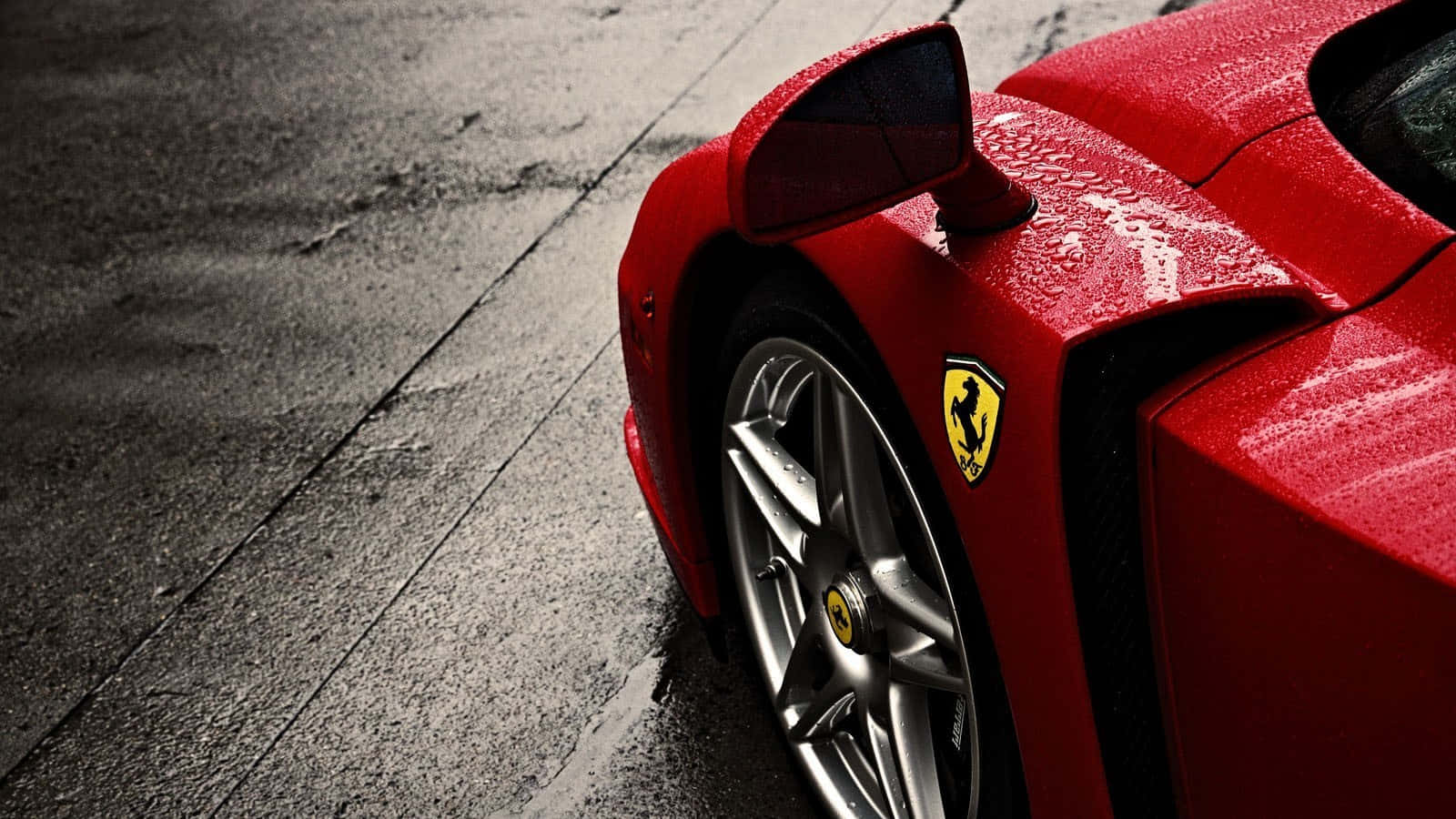 Experience The Thrill Of Driving A Classic Ferrari Wallpaper