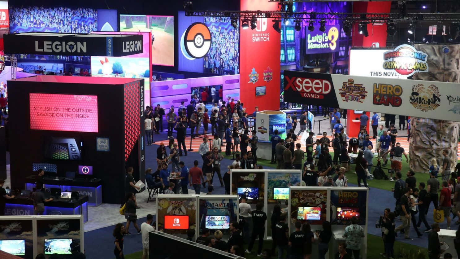 Explore The Latest Trends In Gaming At A Convention Wallpaper