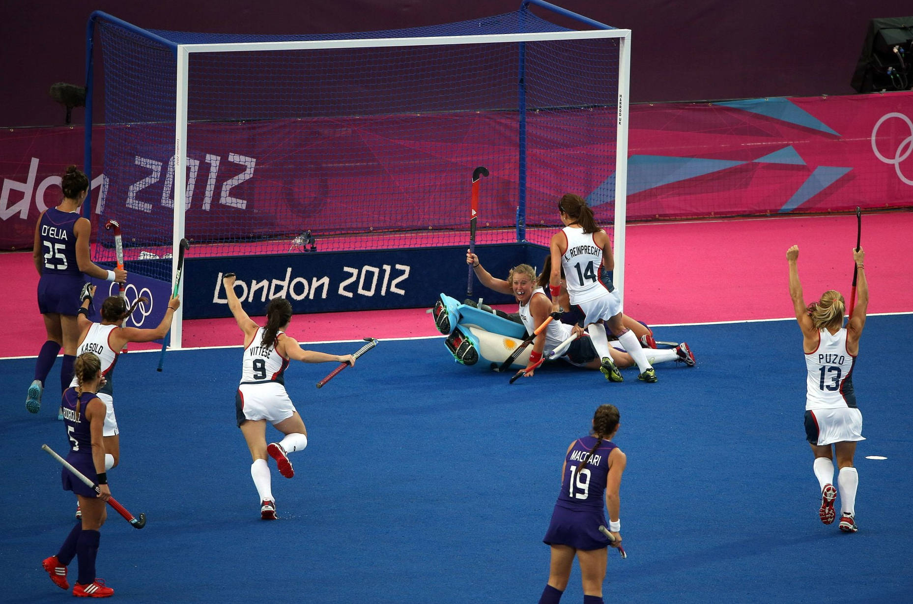 Explosive Field Hockey Match At The 2012 Olympic Games Wallpaper