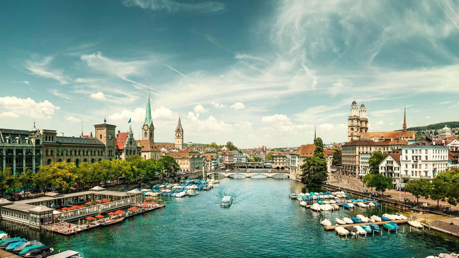 Exquisite Scenery Of Zurich Skyline At Sunset Wallpaper