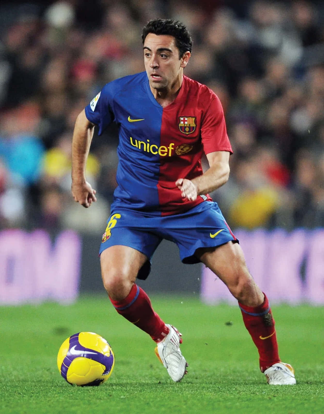 F C Barcelona Midfielder In Action.jpg Wallpaper