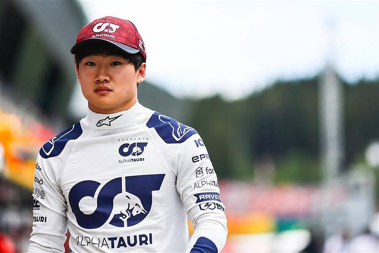 F1 Racer Yuki Tsunoda Wearing Red Cap Wallpaper