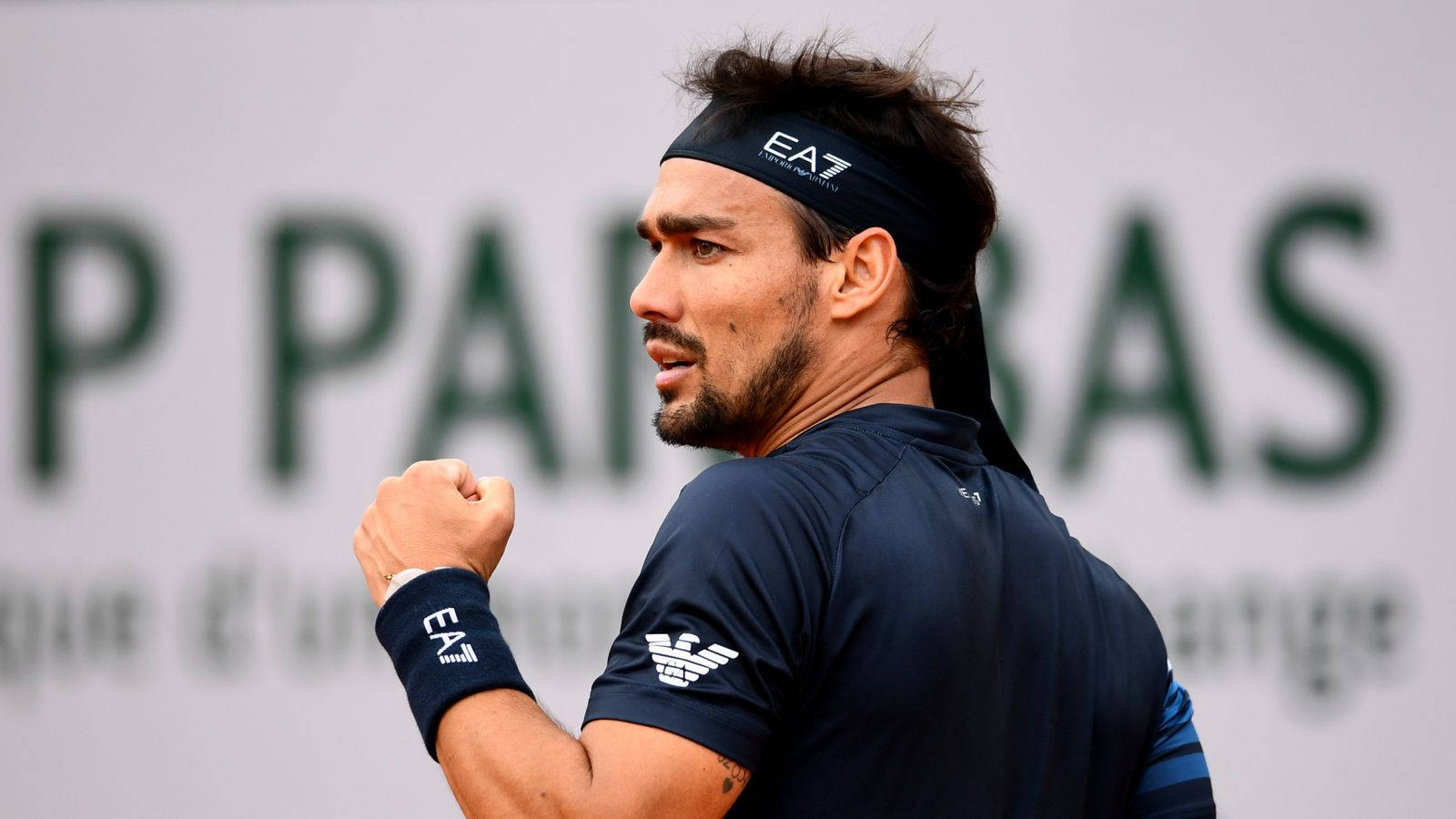 Fabio Fognini Celebrating Victory With A Clenched Fist. Wallpaper