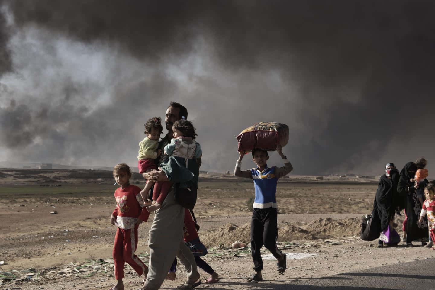 Family Receiving Humanitarian Aid Wallpaper