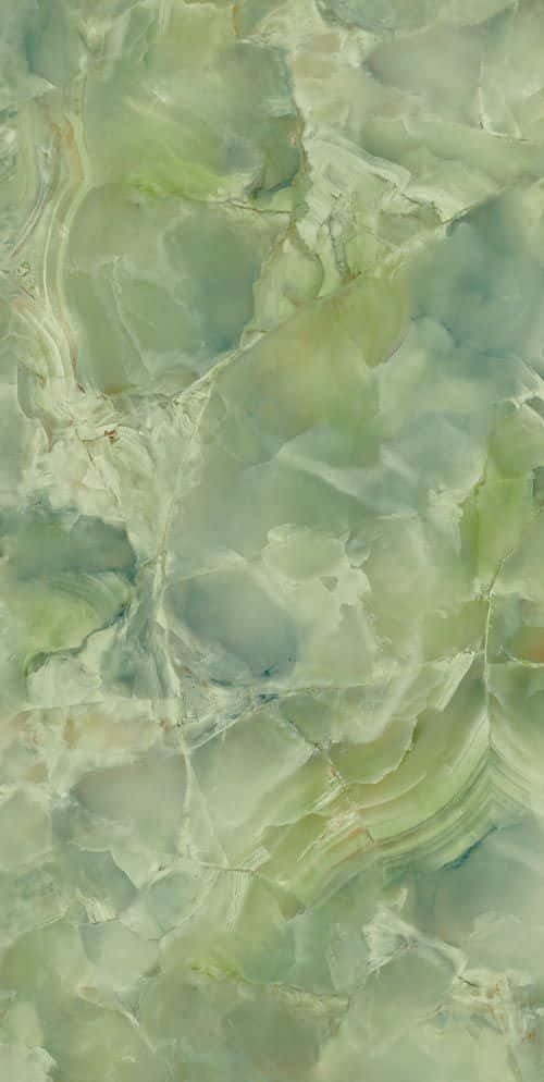 Feel A Sense Of Renewal With This Calming Yet Modern Mint Green Marble Wallpaper