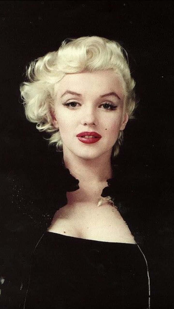 Feel Confident With Marilyn Monroe As Your Phone Wallpaper Wallpaper