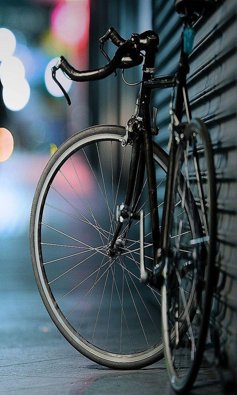 Feel The Breeze And Explore The Open Road With Bicycle Iphone. Wallpaper