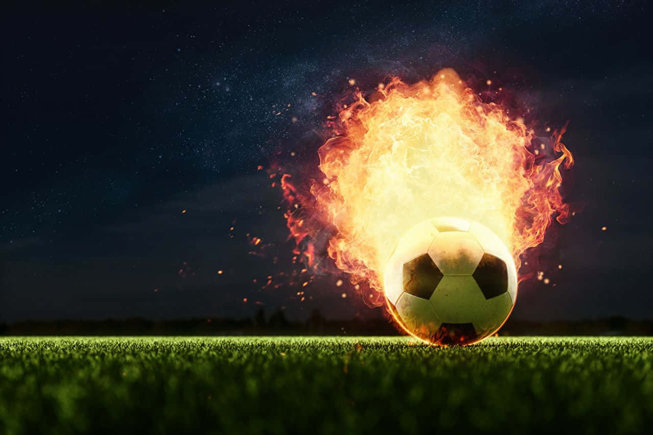 Feel The Heat Of Football On Fire Wallpaper