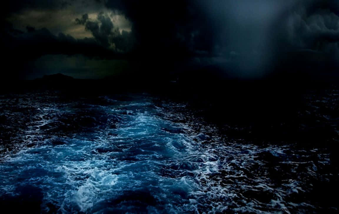 Feel The Power Of Raw Nature Through This Awe-inspiring Image Of An Ocean Storm. Wallpaper