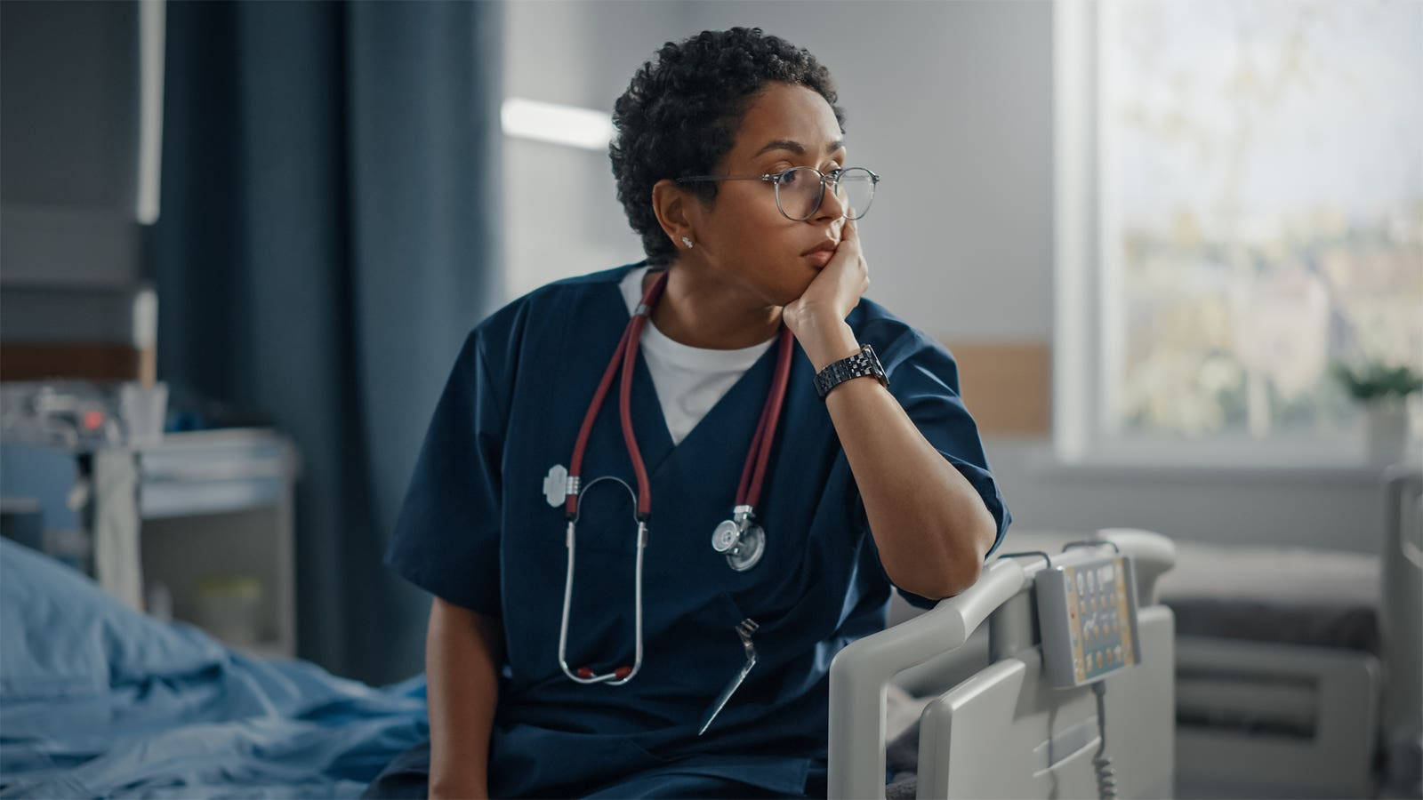 Female Nurse Thinking Resting Wallpaper