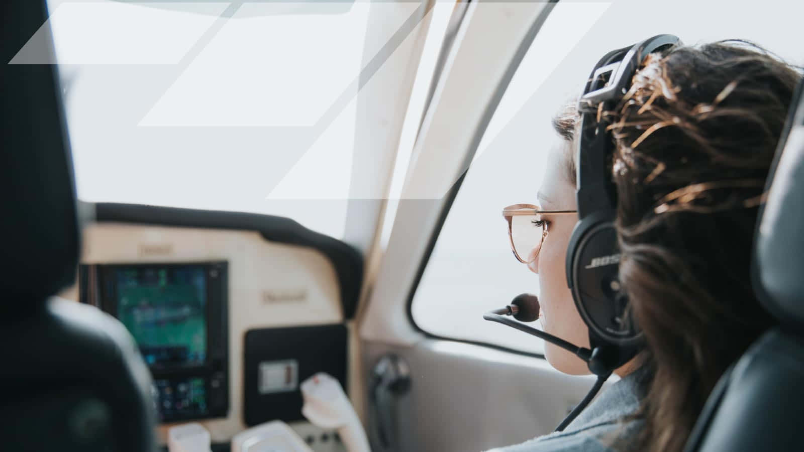 Female Pilot Navigating Wallpaper