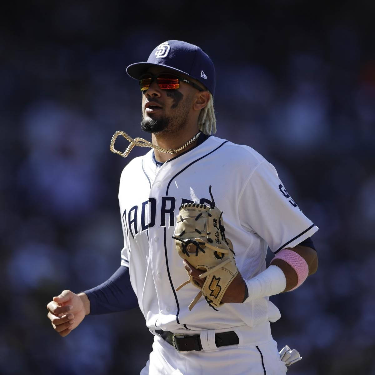 Fernando Tatis Jr Showing Off His Silver Chain Wallpaper