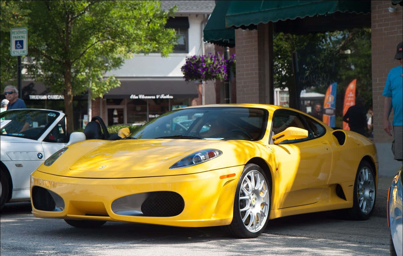 Ferocious Red Ferrari F430 Riding Through The Streets Wallpaper