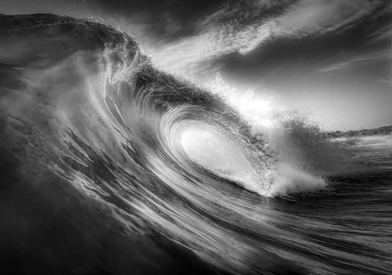 Ferocious Tsunami Waves Approaching Shore Wallpaper