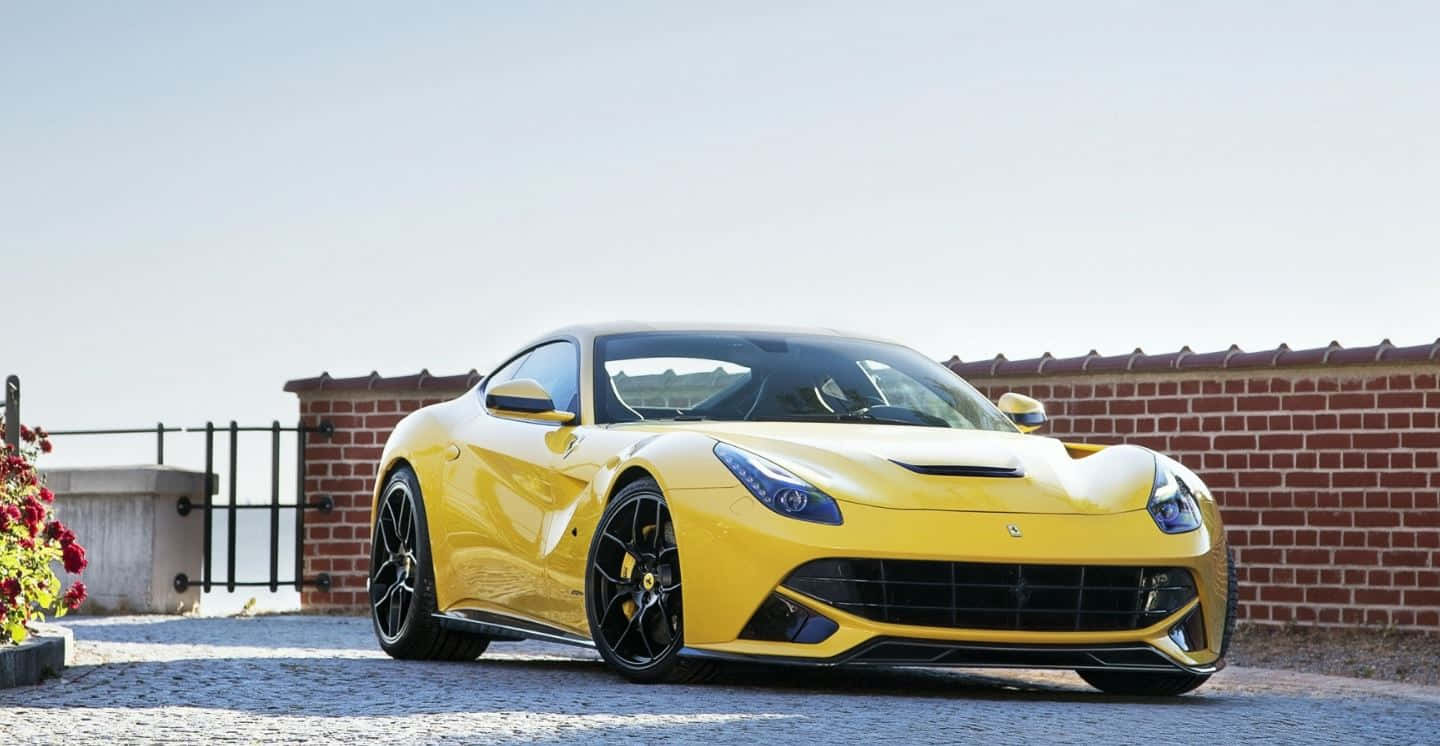 Ferrari F12 Berlinetta In Motion On A Road Wallpaper