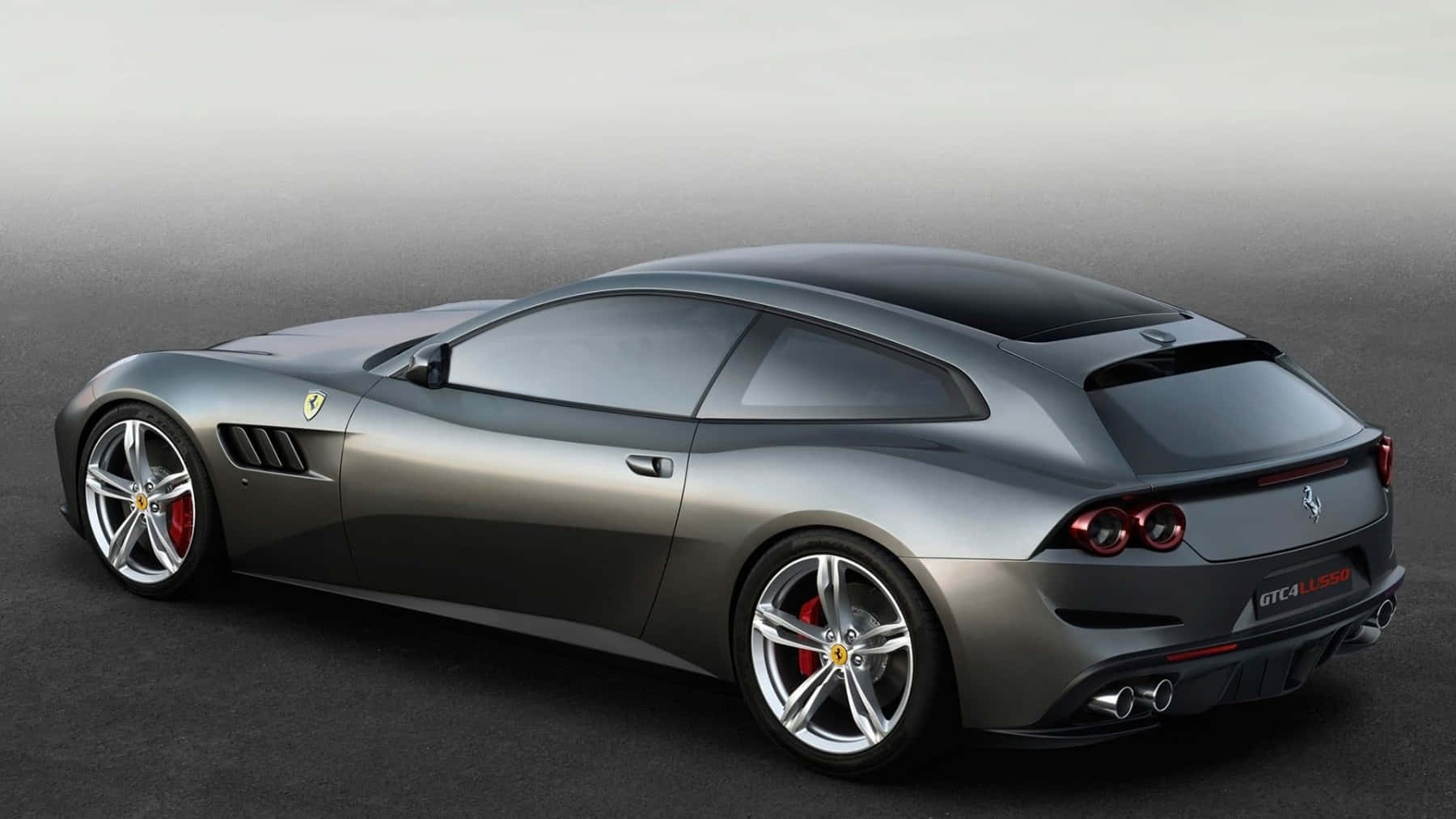 Ferrari Gtc4lusso Luxury Sports Car In Action Wallpaper